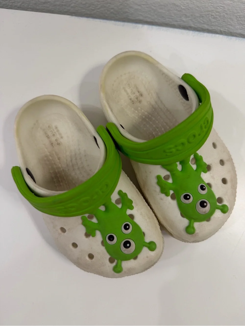 CROCS White Kids Clogs with Bright Green Monster Accents